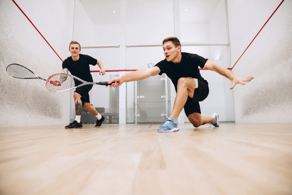 teens playing squash